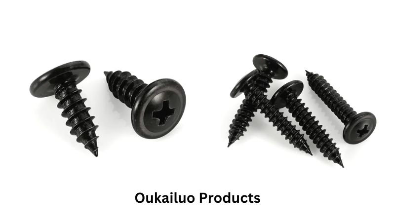 Four sleek black Phillips screws are laid out on a white background.