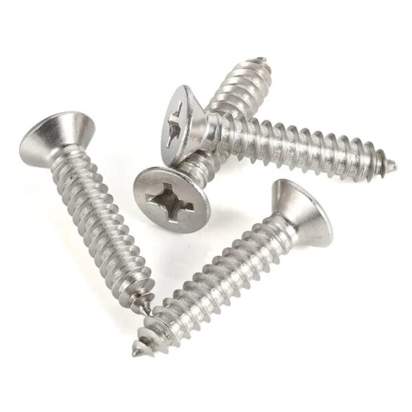 Four stainless steel countersunk flat head screws lie scattered on a white background.