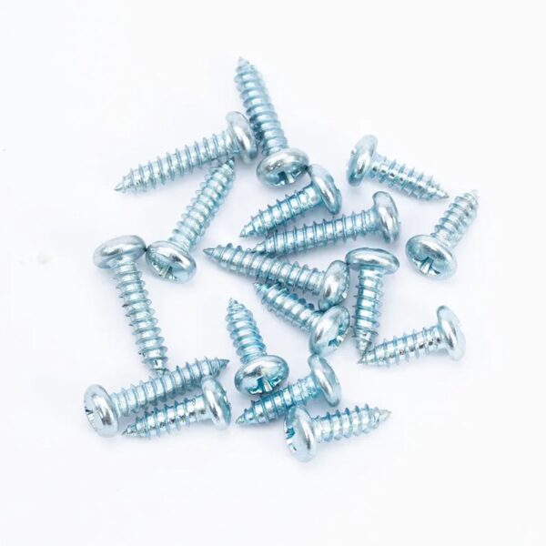 Zinc-plated galvanized steel Phillips pan head wood self-tapping screws scattered on a white background.