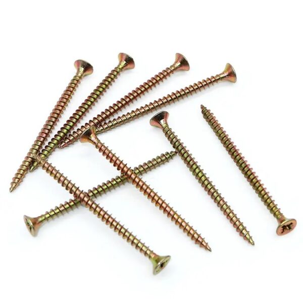 Eight yellow zinc-plated Phillips countersunk wood screws scattered on a white surface.