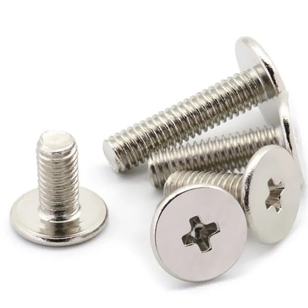 Close-up of five Stainless Steel A2 Cross Phillips Ultra Thin Flat Head Screws, showing threads, on a white background.