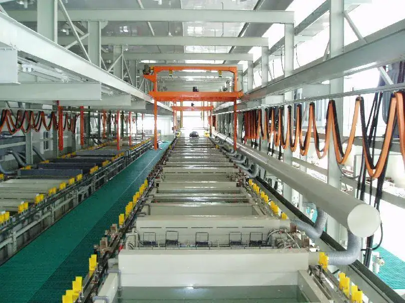 Modern high-speed glass bottle manufacturing line with automated conveyor system and industrial machinery for efficient production.